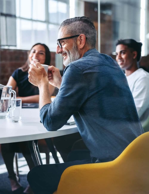 people sitting at conference table