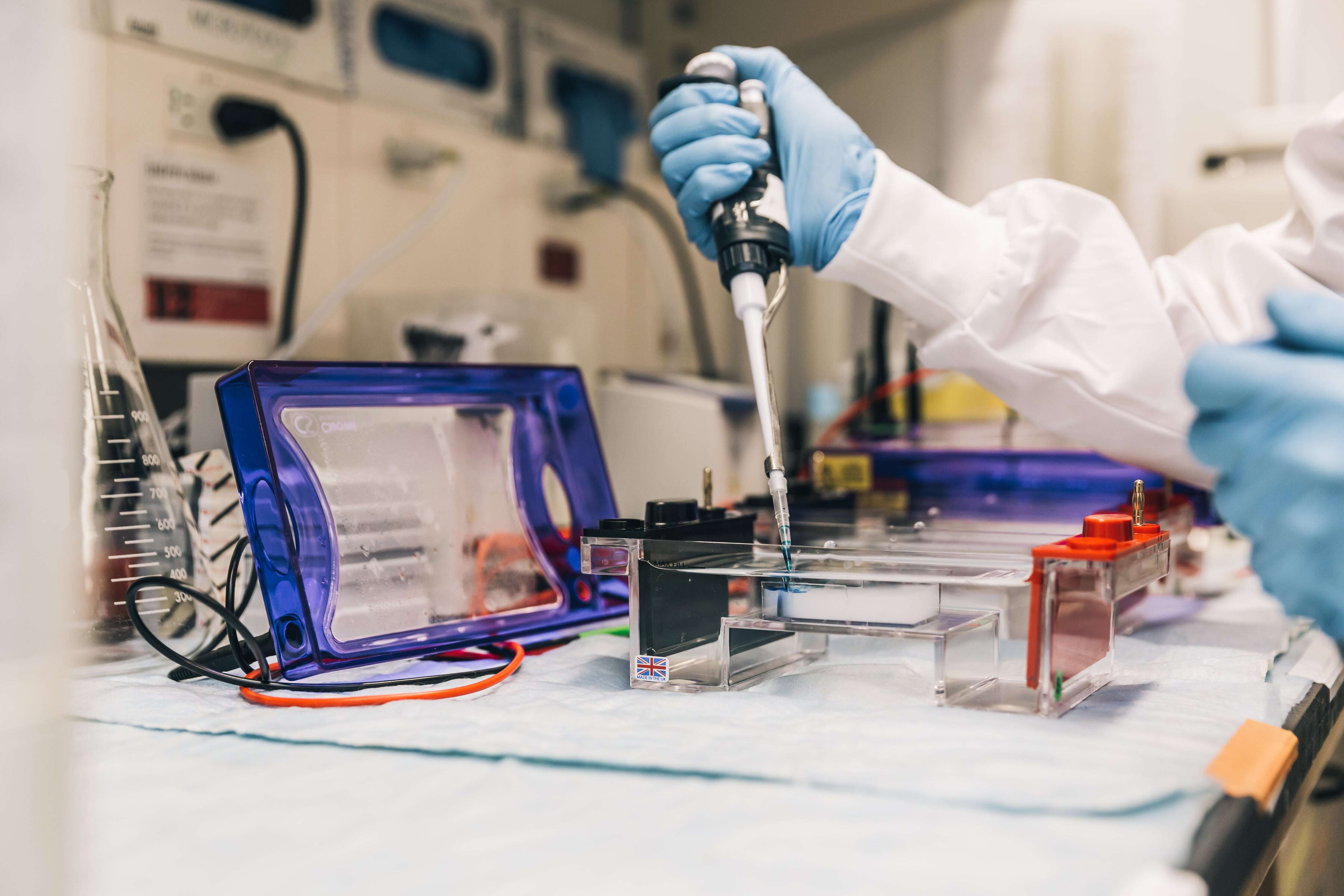 scientist-in-lab-with-pipette